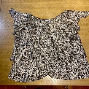This is an animal print blouse that is layered and for women Plus sized.